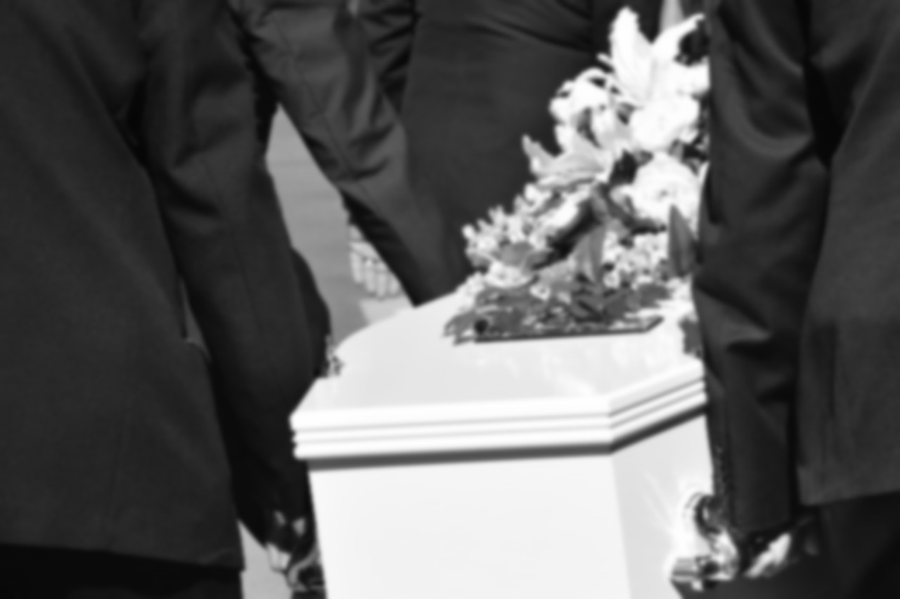 casket_flowers_and_pallbearers