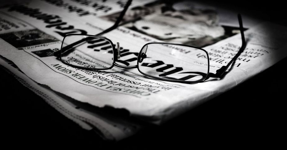 glasses and newspaper
