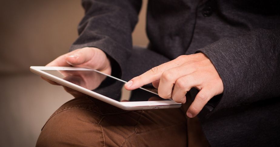 man using a tablet