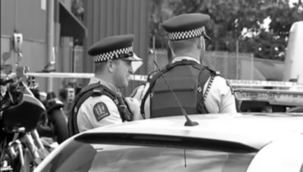 rear view of two NZ Policement in uniform