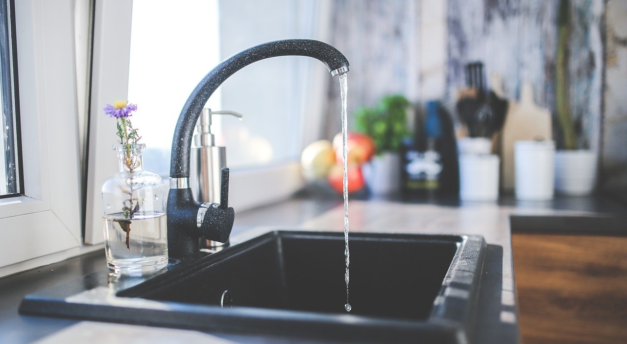 kitchen tap running